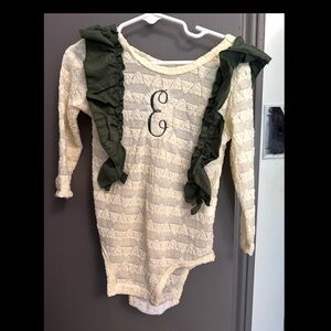 “E” monogrammed onesie